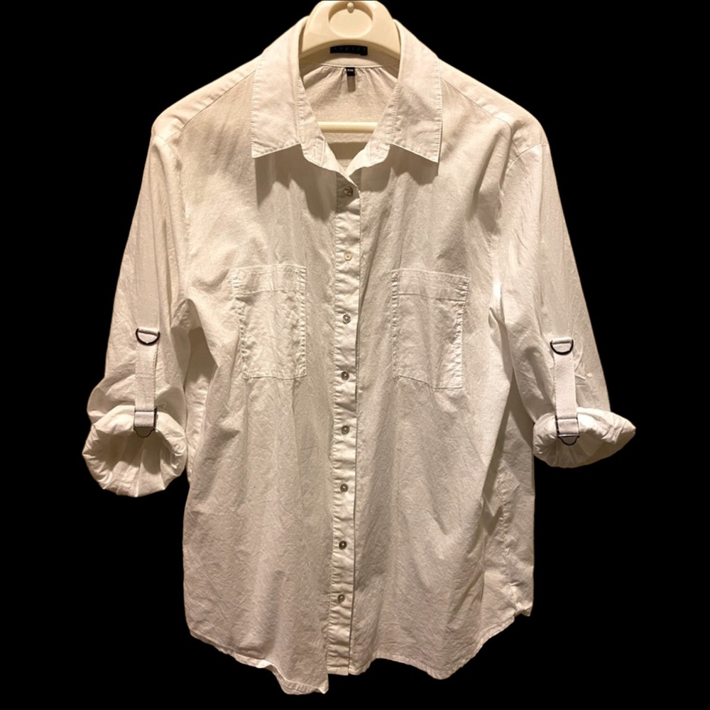 Ispiri brand white button blouse with rolled/buckle detail sleeves.
